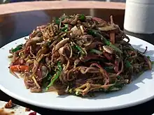 Flor de plátano y cebollino salteado (蕉花炒韭菜), gastronomía china
