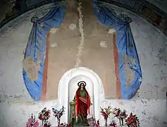 Detalle del retablo de pincel en el altar mayor de la iglesia parroquial de Arroyo Cerezo, Castielfabib (Valencia).