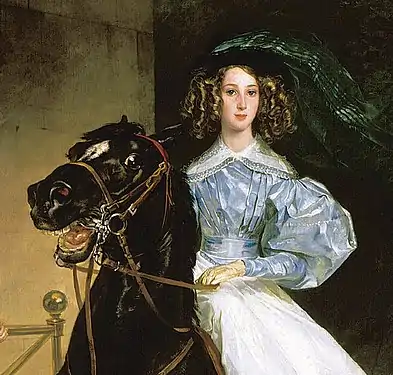 Amazona y caballo.