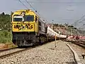 Locomotora 319.238 con el "butanero" Granollers - Tarragona.