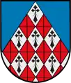 Cortinado Losanjado de gules y plata hecho de arniño, y campo de azur