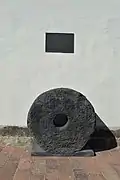 Muela de molino del Molino del Rey.