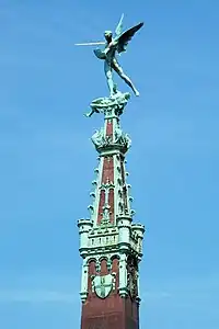 Estatua de San Miguel matando al dragón por Pierre-Jean Braecke