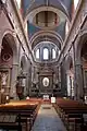 Nave, coro con Adoración del Santísimo Sacramento.