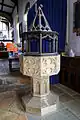 Tapa con forma de templete, de una iglesia anglicana en Essex.