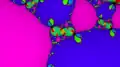 Fractal de Newton para un polinomio de séptimo orden, coloreado por la raíz alcanzada y sombreado por la tasa de convergencia