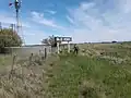 Parte del andén y nomenclador.