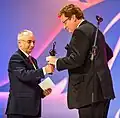 Hacıbala Abutalıbov (izquierda) junto al Alcalde de Düsseldorf, Dirk Elbers en la semifinal de Eurovisión 2012.