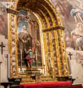 Fig. 54. Santa Isabel de Portugal, Eugenio Cajés, 1629. Pintura de la reina portuguesa del siglo XIII vestida con el hábito de las clarisas, al fondo un paisaje urbano.