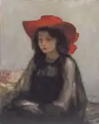 Joven con sombrero rojo en el museo de artes de Kiev