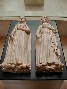 Estatuas yacentes de Juana de Évreux y Carlos IV de Francia (1372) en la abadía de Maubuisson, cerca de París.