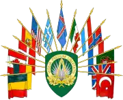 Banderas son los soportes en el escudo de armas de la Cuartel General Supremo de las Potencias Aliadas en Europa 1982.