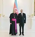 Nuncio con faja morada de seda