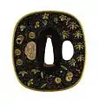 Tsuba con flores de otoño.