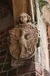 Un ángel es el único soporte de esta escultura de Cracovia de las Escudo de Polonia.