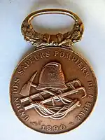 Medalla "Bomberos de Eure". 1890. (Verso) Grabador: Frédéric-Charles Victor de Vernon