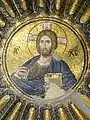 Mosaico de la cúpula sur del nártex interno (esonártex) de San Salvador en Cora. Es un Pantokrator rodeado por imágenes que representan la genealogía de Cristo.