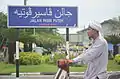 Cartel en Jawi de la carretera a Pasir Puteh, en Kelantan (Malasia)