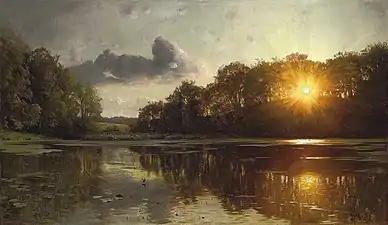 Amanecer sobre lago helado