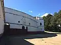 Lateral, taquillas y acceso a gradas.