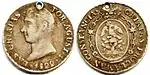 Ejemplo de versión del escudo oficial del Primer Imperio mexicano, en moneda de medio Real, 1822.