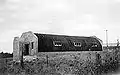 Cobertizo Nissen en Port Lincoln, Australia del Sur, en proceso de convertirse en la Iglesia Presbiteriana de Juan Calvino a principios de la década de 1950. Fue demolido a finales de la década de 1960.