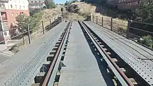 Puente de Hierro, en la Línea ferroviaria Segovia-Medina del Campo cuando cruzaba el arroyo