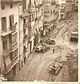 Limpieza del barro en la calle Pintor Sorolla, 2 de noviembre de 1957.