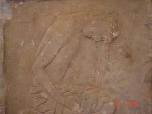 Relieve con la representación de un adolescente procedente de Geraki, del siglo VI a. C.