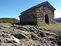 Fachada oeste con la puerta abierta con posterioridad
