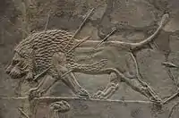 León moribundo, Cacería de leones de Asurbanipal, palacio del norte de Nínive.