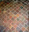 Baldosa medieval decorada en la Iglesia de San Andrés próxima a Barton Bendish, Norfolk, Gran Bretaña.