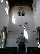 Vanos geminados en arc brisé droit en la iglesia de Santa María en  Deerhurst