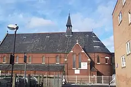 La antigua Iglesia de Lady Margaret, Chatham Street, Southwark, Londres, construida para la Misión de St John's College (Cambridge) en 1888-1889, ahora utilizada como la Orden de los Querubines y la iglesia Serafín. Ladrillo rojo estilo inglés temprano con lancetas y ábside típicos.