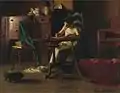 Mujer escribiendo sobre una mesa, c. 1905.