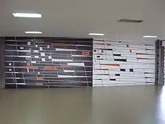 Mural de Víctor ValeraTítulo: Sin título.Año: 1955.Ubicación: Entrada principal, planta alta, subiendo por la rampa.