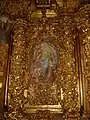 Detalle de la Anunciación en el retablo mayor.