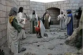 Escena 19: Jesús y la mujer sorprendida en adulterio