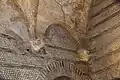 Ménsulas en la base de los arcos de la bóveda.